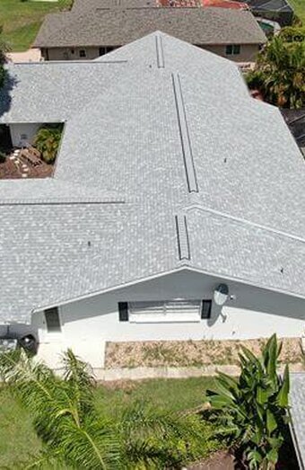 Storm Damage Roof Replacement X